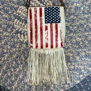 Red, white, and blue Blazin Roxx Crossbody purse with fringe